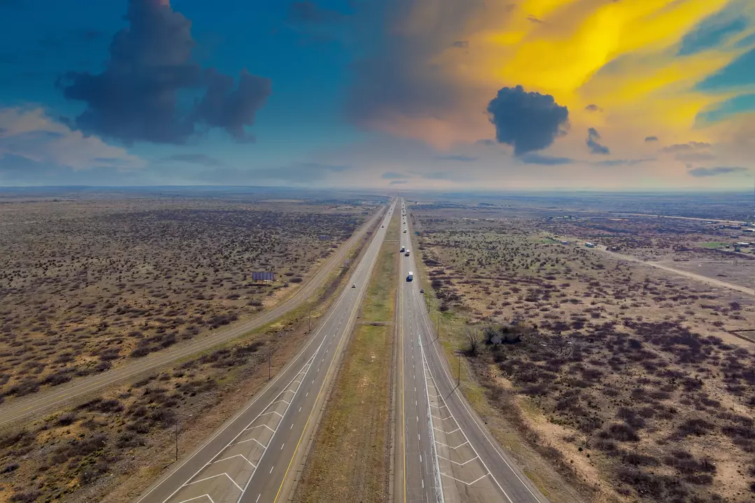 Aerial view of trucks driving on a New Mexico highway