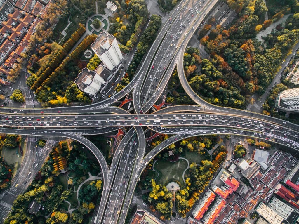 An aerial view of cars on a highway showing what the MUTCD is